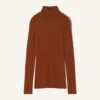 Maglione a collo alto in lana merino e seta Maglione a collo alto in lana merino e seta