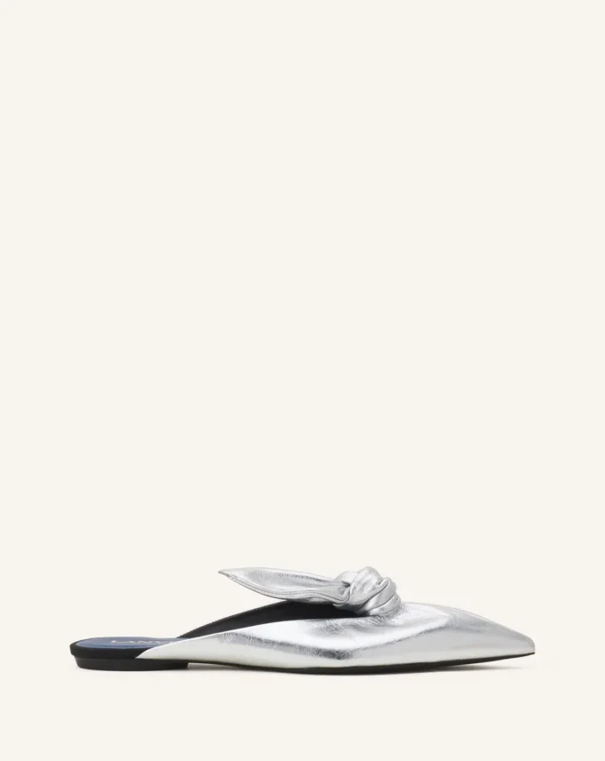 Mule Midnight Step con fiocco in pelle metallizzata Mule Midnight Step con fiocco in pelle metallizzata