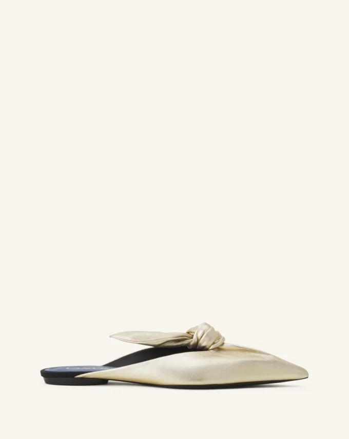 Mule Midnight Step con fiocco in pelle metallizzata Mule Midnight Step con fiocco in pelle metallizzata
