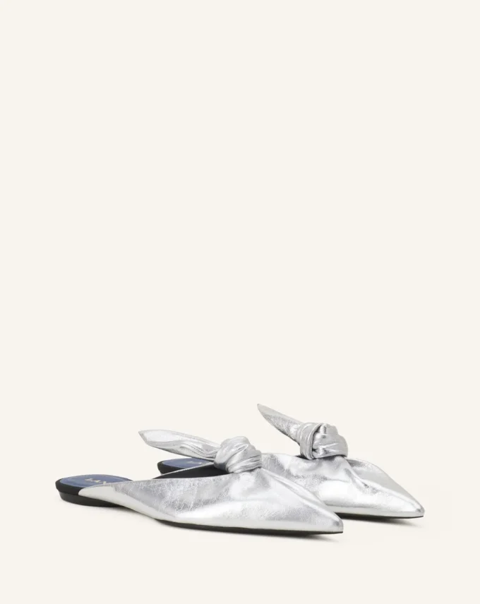 Mule Midnight Step con fiocco in pelle metallizzata Mule Midnight Step con fiocco in pelle metallizzata