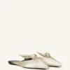 Mule Midnight Step con fiocco in pelle metallizzata Mule Midnight Step con fiocco in pelle metallizzata