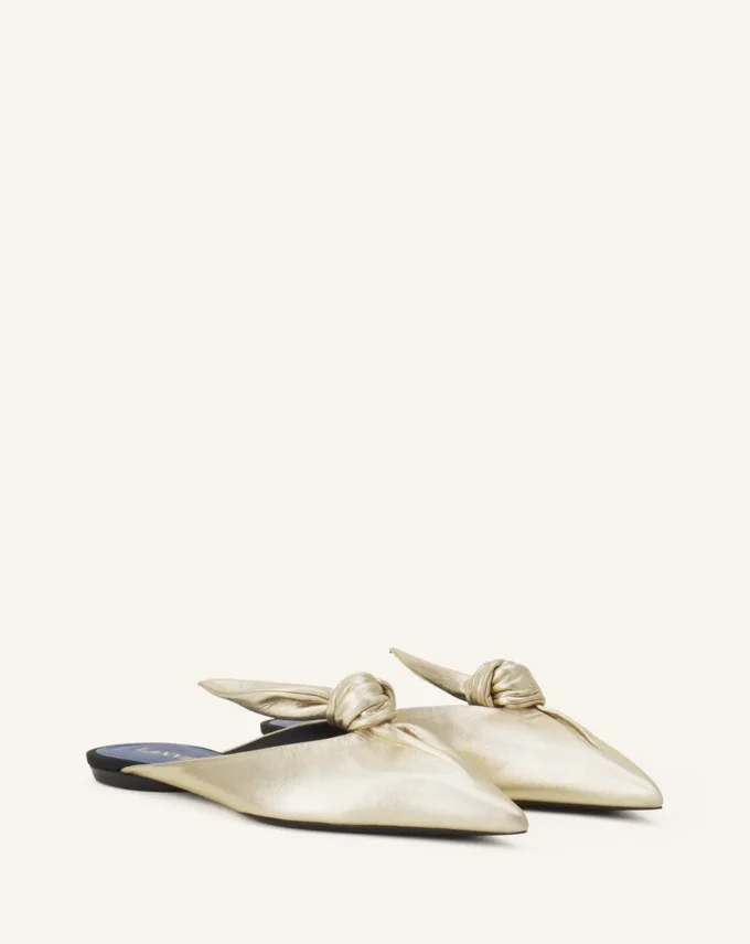 Mule Midnight Step con fiocco in pelle metallizzata Mule Midnight Step con fiocco in pelle metallizzata