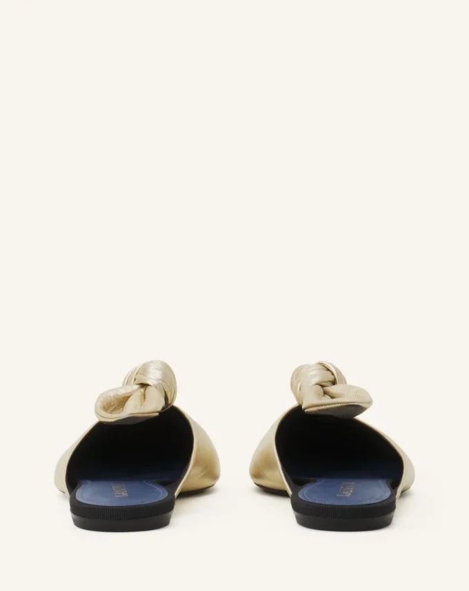 Mule Midnight Step con fiocco in pelle metallizzata Mule Midnight Step con fiocco in pelle metallizzata