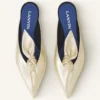 Mule Midnight Step con fiocco in pelle metallizzata Mule Midnight Step con fiocco in pelle metallizzata