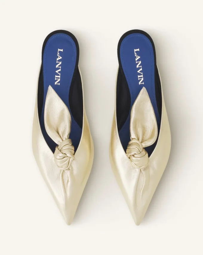 Mule Midnight Step con fiocco in pelle metallizzata Mule Midnight Step con fiocco in pelle metallizzata