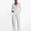 Pantaloni in cotone con pinces Pantaloni in cotone con pinces
